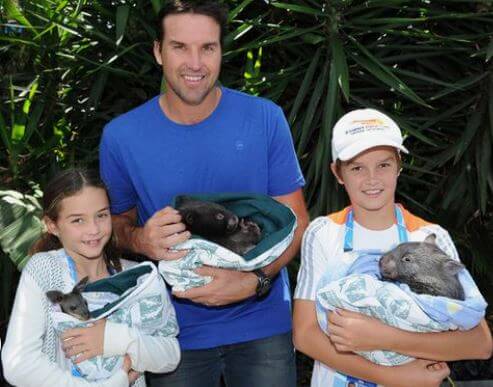 Joshua with his father Pat Rafter and sister India.